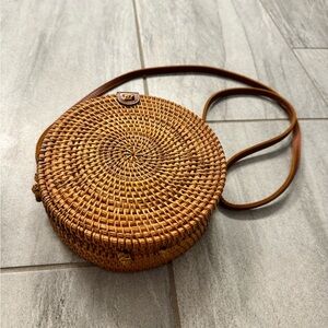 Circular rattan crossbody bag